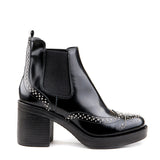 Rubber soled ankle boot with studs